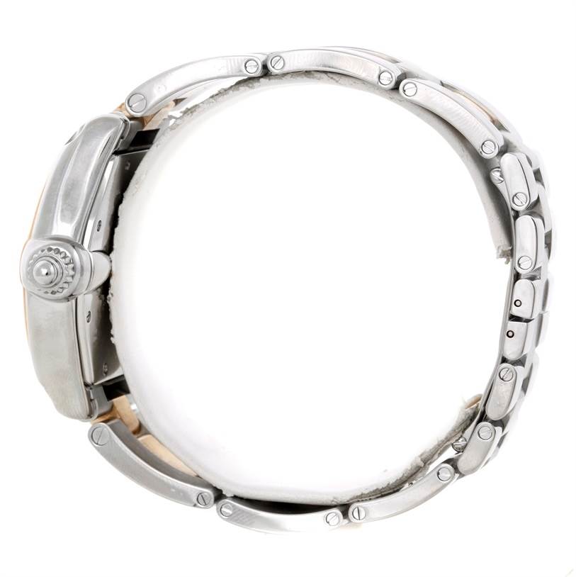 The image shows a side profile of the Cartier Roadster W62031Y4 Men's Steel and Gold (two tone) Silver Dial W62031Y4 Men's Steel and Gold (two tone) Silver Dial watch, highlighting its crown, case, and bracelet links.