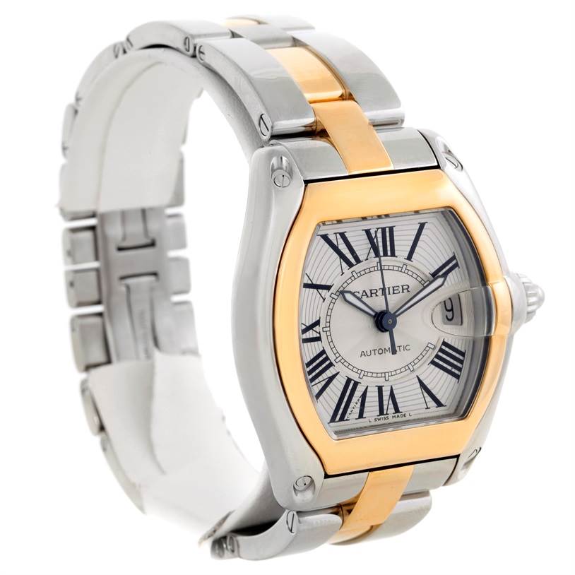 This image shows a Cartier Roadster W62031Y4 Men's Steel and Gold (two tone) Silver Dial W62031Y4 Men's Steel and Gold (two tone) Silver Dial watch from a front-side angle, highlighting its two-tone strap and dial with date display.