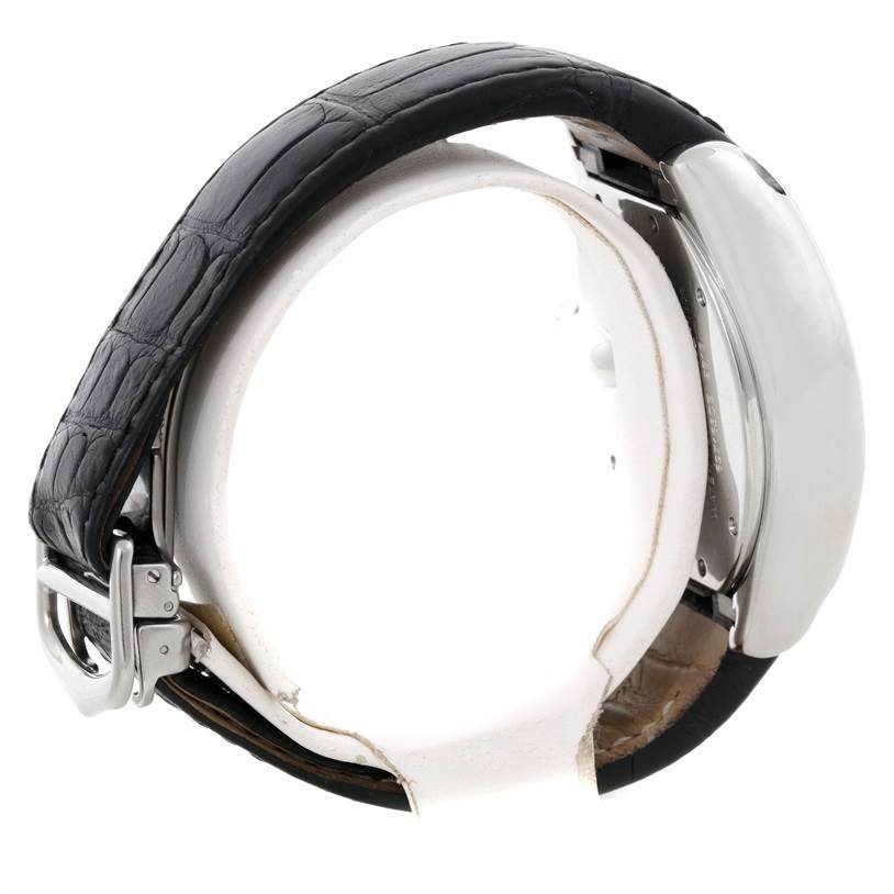 This side view image of the Cartier Roadster W62019X6 Men's Stainless Steel Silver Dial W62019X6 Men's Stainless Steel Silver Dial watch shows its black leather strap, buckle, and stainless steel case.