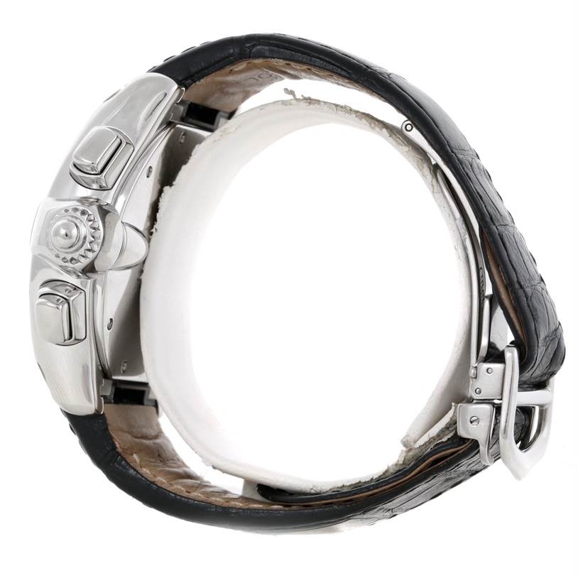 This image shows a side view of the Cartier Roadster W62019X6 Men's Stainless Steel Silver Dial W62019X6 Men's Stainless Steel Silver Dial wristwatch, highlighting the crown, pushers, and black leather strap with the clasp.