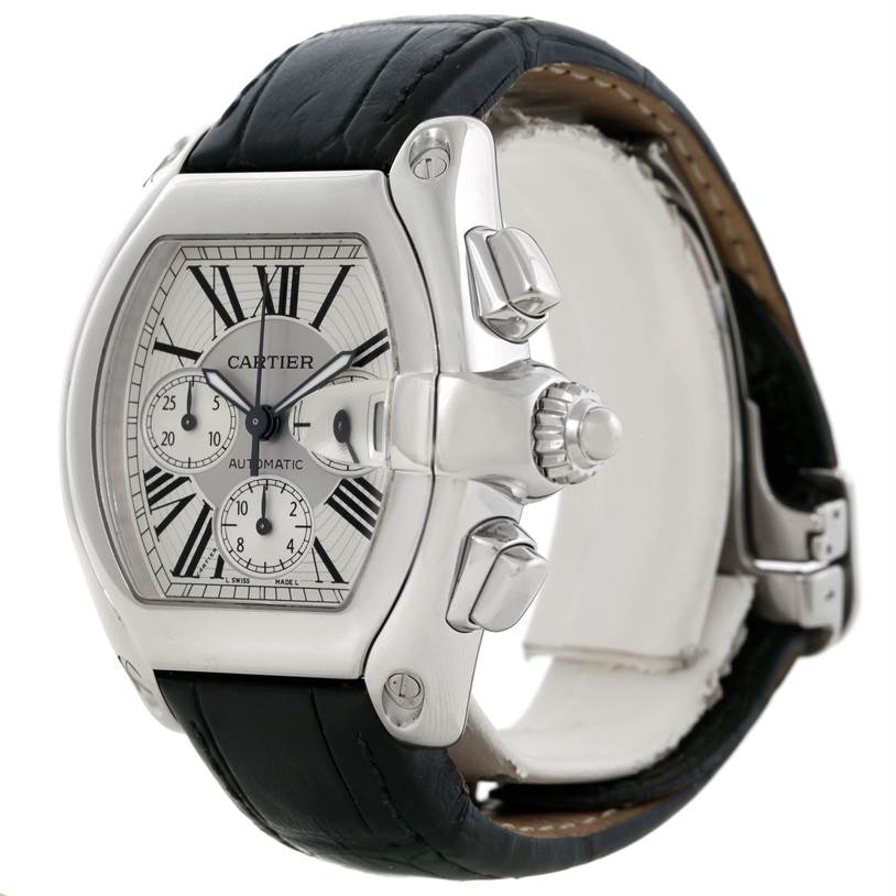 The image shows a Cartier Roadster W62019X6 Men's Stainless Steel Silver Dial W62019X6 Men's Stainless Steel Silver Dial watch at an angled view highlighting its face, crown, pushers, and leather strap.