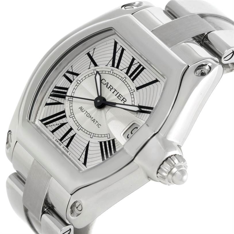 The image shows a close-up angle of the Cartier Roadster W62025V3 Men's Stainless Steel Silver Dial W62025V3 Men's Stainless Steel Silver Dial watch, highlighting its face, bezel, and part of the bracelet.