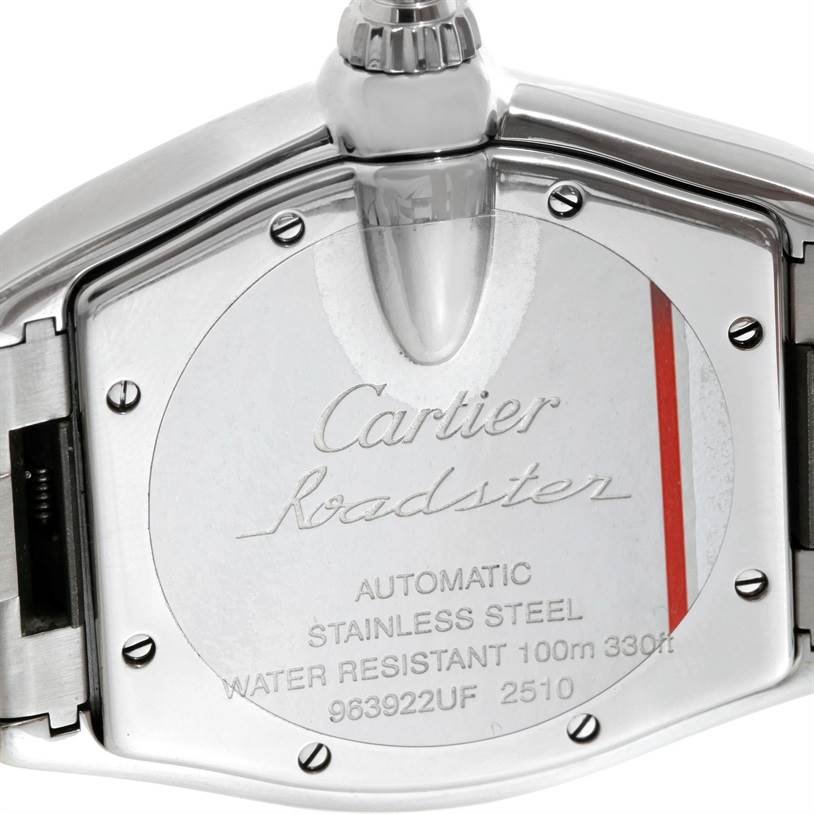 The image shows the back plate and crown of the Cartier Roadster W62025V3 Men's Stainless Steel Silver Dial W62025V3 Men's Stainless Steel Silver Dial watch, highlighting its inscriptions and stainless steel material.