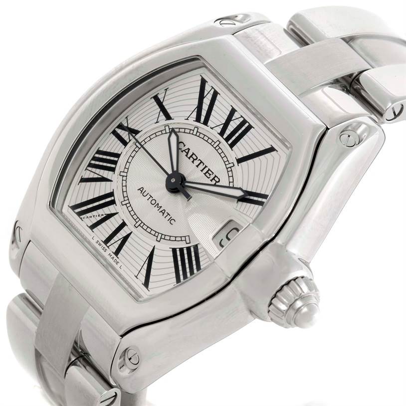 The image shows a close-up view of the Cartier Roadster W62025V3 Men's Stainless Steel Silver Dial W62025V3 Men's Stainless Steel Silver Dial watch, highlighting its dial, bezel, crown, and bracelet.