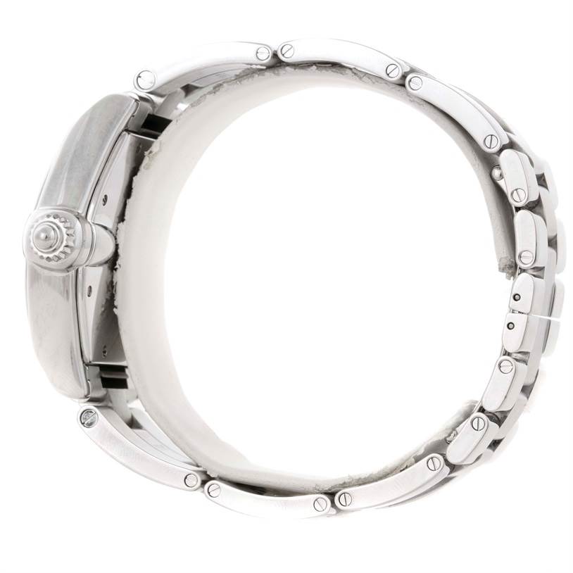 This side view of the Cartier Roadster W62025V3 Men's Stainless Steel Silver Dial W62025V3 Men's Stainless Steel Silver Dial model watch showcases its crown and metal link bracelet.