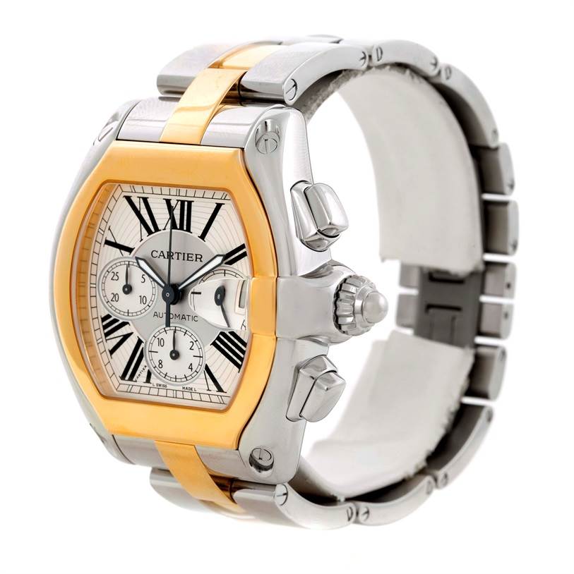 This image shows a Cartier Roadster W62027Z1 Men's Steel and Gold (two tone) Silver Dial W62027Z1 Men's Steel and Gold (two tone) Silver Dial watch at a three-quarter angle, highlighting the face, crown, pushers, bezel, and part of the bracelet.