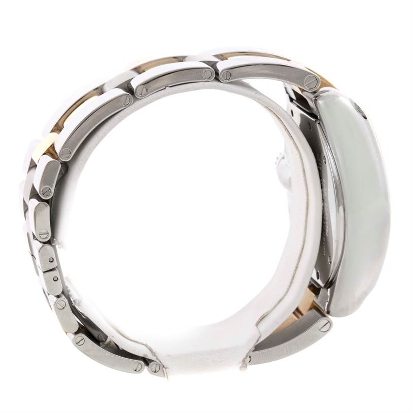 The image shows a Cartier Roadster W62027Z1 Men's Steel and Gold (two tone) Silver Dial W62027Z1 Men's Steel and Gold (two tone) Silver Dial watch from a side angle, highlighting its stainless steel bracelet and case.