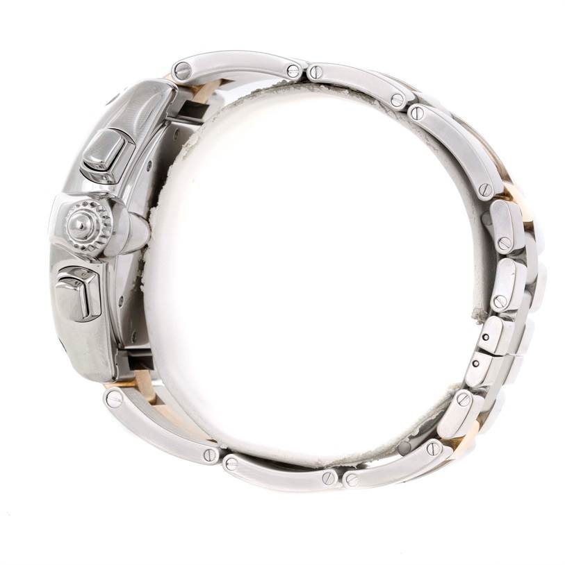 The image shows a side view of the Cartier Roadster W62027Z1 Men's Steel and Gold (two tone) Silver Dial W62027Z1 Men's Steel and Gold (two tone) Silver Dial watch, focusing on the crown, pushers, and metal bracelet.