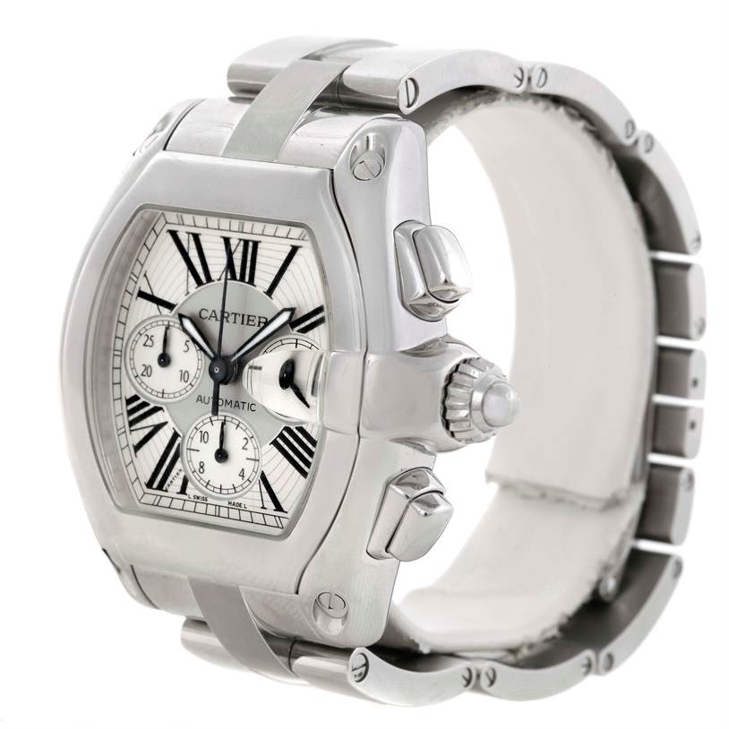 The image shows a side and front angle of a Cartier Roadster W62019X6 Men's Stainless Steel Silver Dial W62019X6 Men's Stainless Steel Silver Dial watch, highlighting the bezel, crown, dial, and bracelet.