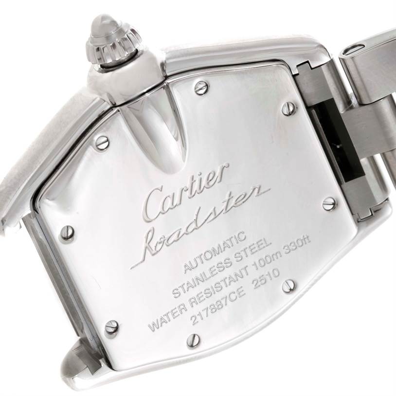 The image shows the back casing and part of the bracelet of a Cartier Roadster W62000V3 Men's Stainless Steel Silver Dial W62000V3 Men's Stainless Steel Silver Dial watch, highlighting its inscriptions and automatic movement.
