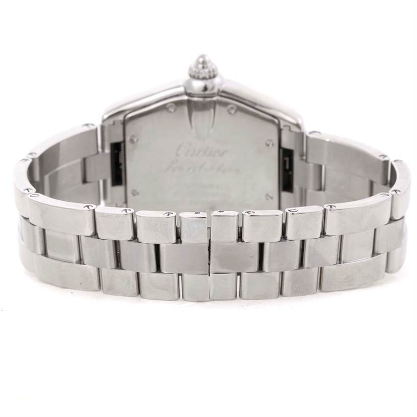 This image depicts the back view of a Roadster model by Cartier, showing the case back and metal bracelet.