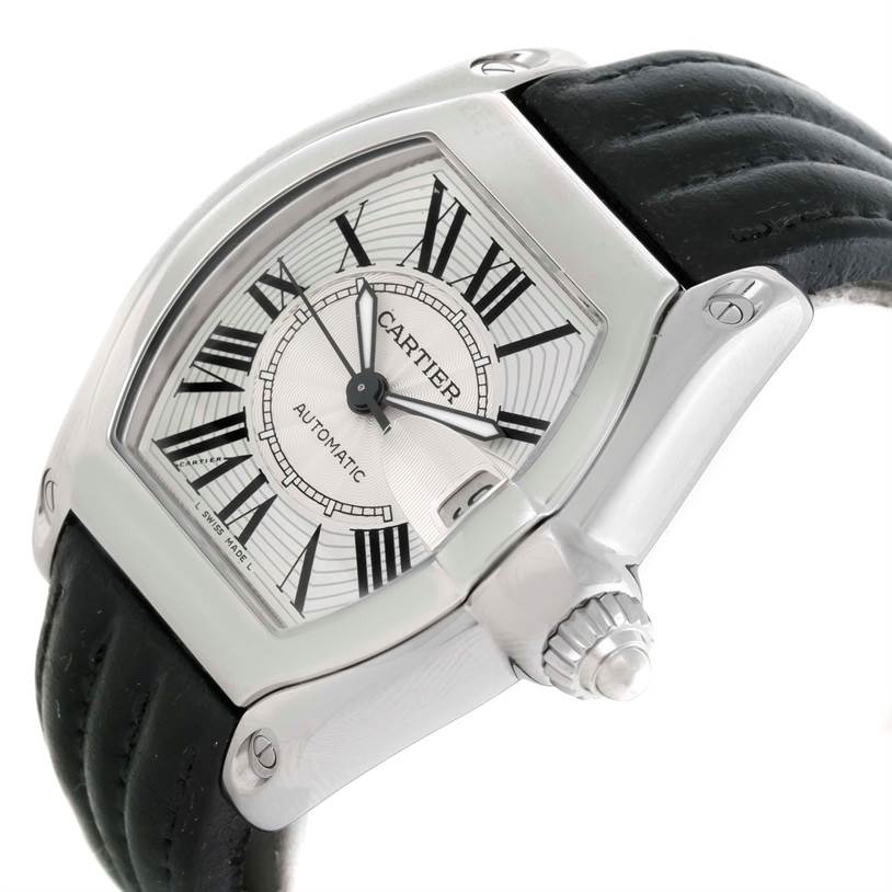 This image shows a close-up, angled view of the Cartier Roadster W62025V3 Men
s Stainless Steel Silver Dial W62025V3 Men
s Stainless Steel Silver Dial
s face and part of its leather strap.