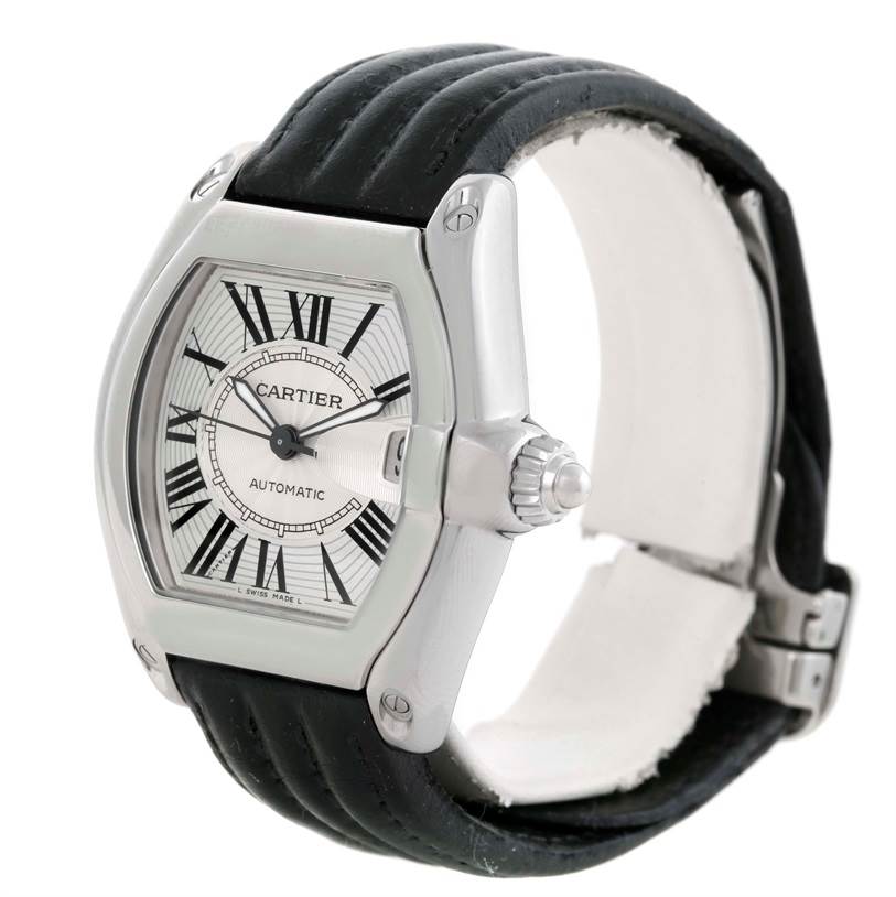 The image shows a Cartier Roadster W62025V3 Men
s Stainless Steel Silver Dial W62025V3 Men
s Stainless Steel Silver Dial watch at an angle highlighting the face, crown, case, and part of the strap.
