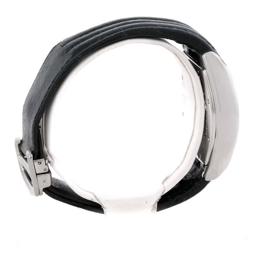 The image shows the side view of a Cartier Roadster W62025V3 Men
s Stainless Steel Silver Dial W62025V3 Men
s Stainless Steel Silver Dial watch, highlighting the case and leather strap.