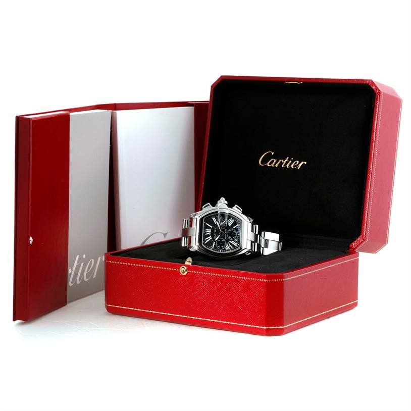 The Cartier Roadster W62020X6 Men's Stainless Steel Black Dial W62020X6 Men's Stainless Steel Black Dial watch is shown front-facing in its red and black presentation box.