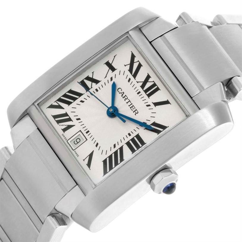 The image shows a close-up of the Cartier Tank Francaise W51002Q3 Men's Stainless Steel Silver Dial W51002Q3 Men's Stainless Steel Silver Dial watch, focusing on the dial, crown, and part of the metal bracelet.