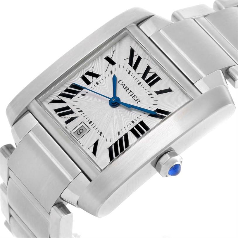 This image shows a Cartier Tank Française watch at an angled close-up, highlighting its dial, Roman numerals, date window, and metal bracelet.