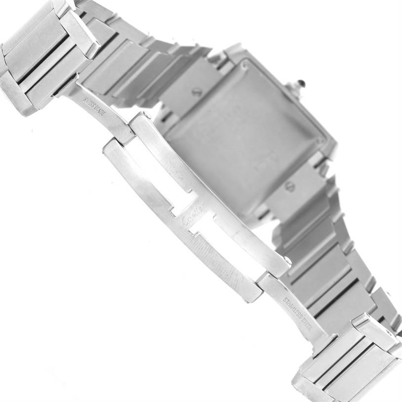 The image shows the back and wristband of a Cartier Tank Française watch at a slight angle.