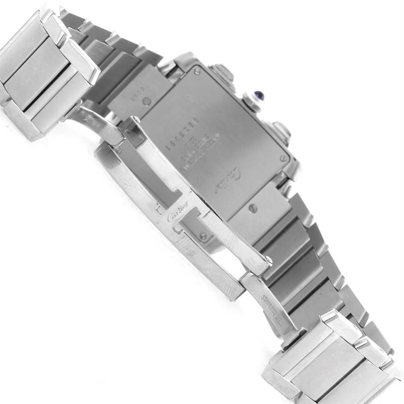 The image shows the underside and clasp mechanism of a Tank Française watch by Cartier.