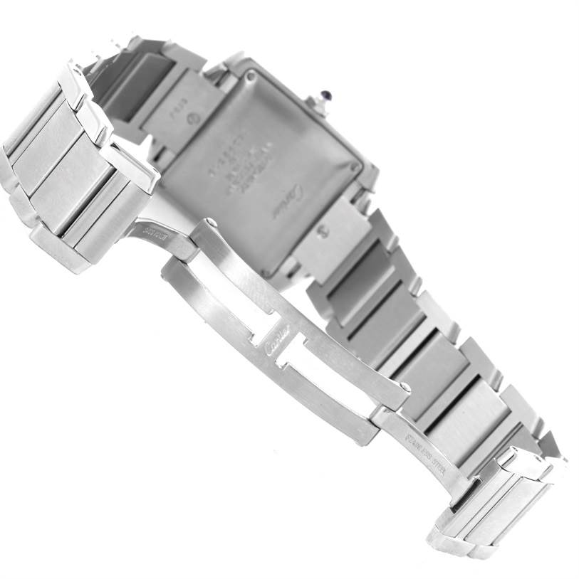 Cartier Tank Française watch shown from the back, highlighting the bracelet and clasp in its open position.