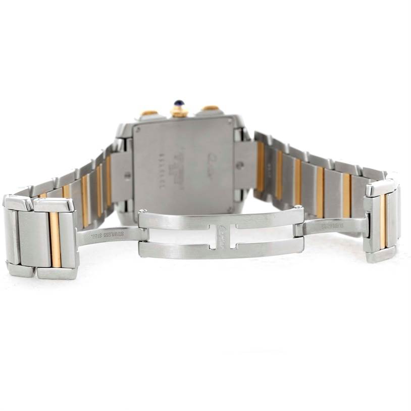 The image shows the back of a Cartier Tank Francaise W51004Q4 Men
s Steel and Gold (two tone) Silver Dial W51004Q4 Men
s Steel and Gold (two tone) Silver Dial watch, highlighting its open bracelet and clasp.