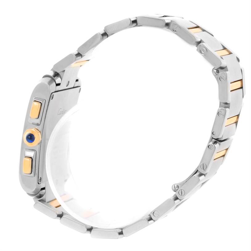 The image shows a side view of a Cartier Tank Francaise W51004Q4 Men
s Steel and Gold (two tone) Silver Dial W51004Q4 Men
s Steel and Gold (two tone) Silver Dial watch highlighting its stainless steel and gold links, and crown with a blue cabochon.