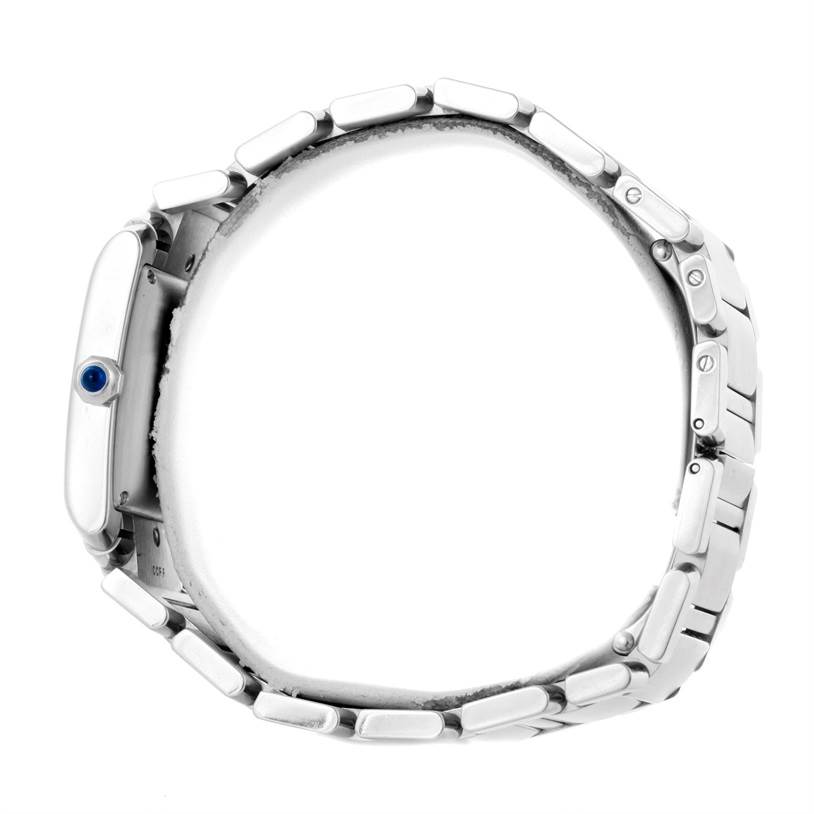 This image shows the side view of a Cartier Tank Francaise W51002Q3 Men
s Stainless Steel Silver Dial W51002Q3 Men
s Stainless Steel Silver Dial watch, focusing on its metal bracelet and crown featuring a blue cabochon.