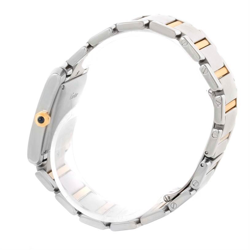 The image shows a side view of a Cartier Tank Francaise W51005Q4 Men
s Steel and Gold (two tone) Silver Dial W51005Q4 Men
s Steel and Gold (two tone) Silver Dial watch, focusing on the bracelet and the side profile of the case with the crown.