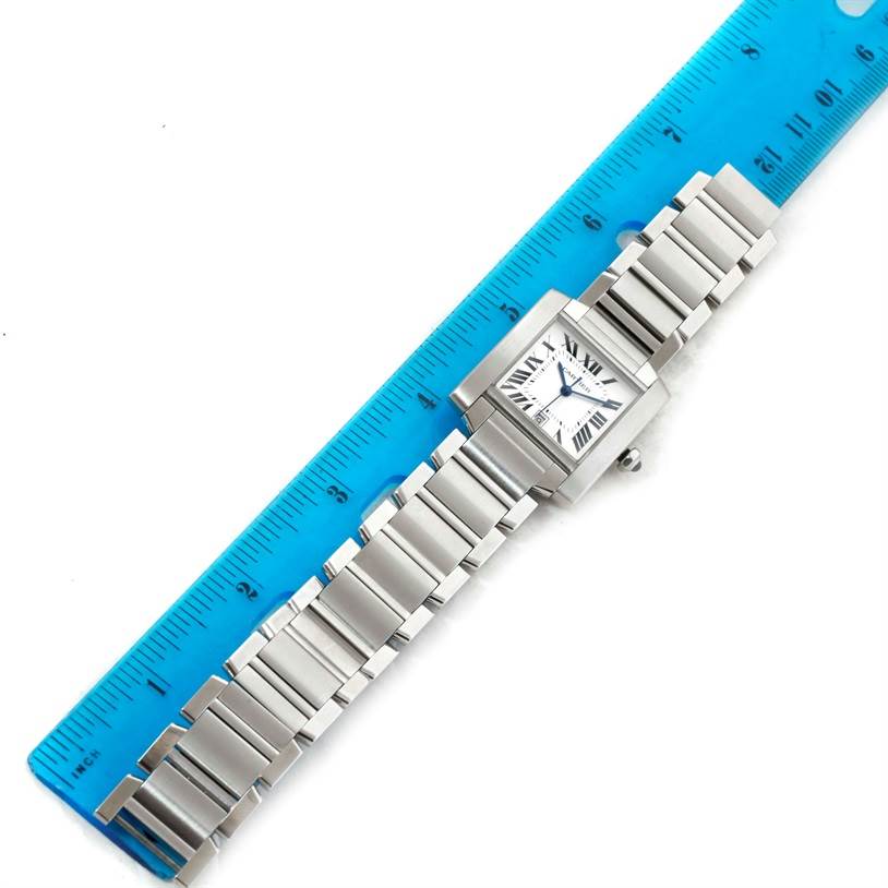 The Cartier Tank Francaise W51002Q3 Stainless Steel Silver Dial W51002Q3 Stainless Steel Silver Dial watch is shown from above, displaying its entire length alongside a ruler.