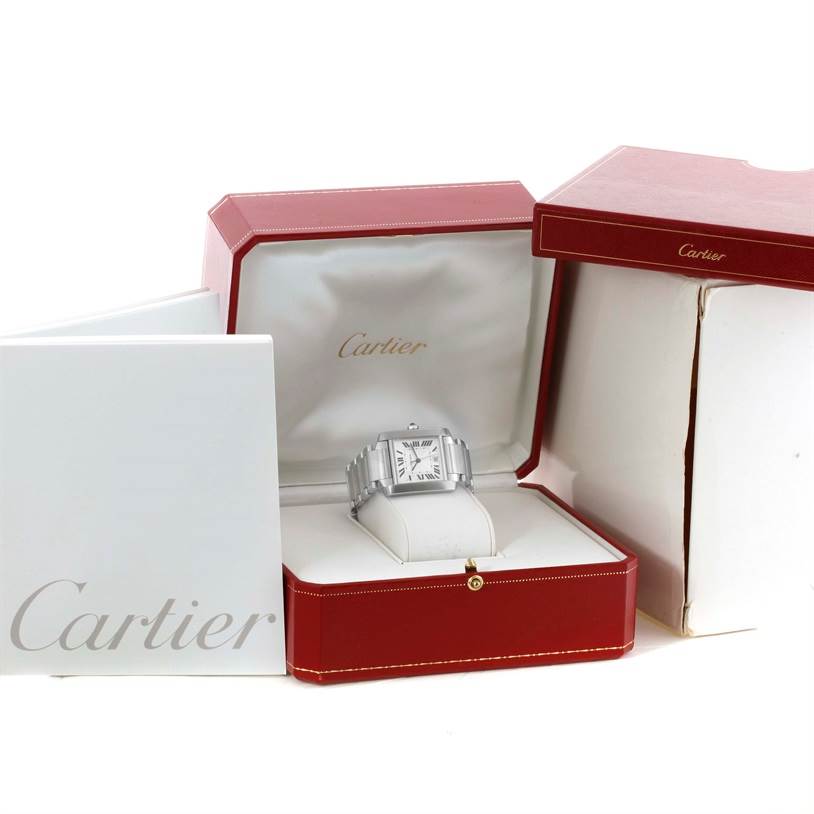 The image shows a Cartier Tank Française watch at a front angle, displayed inside its open, red and white Cartier box.