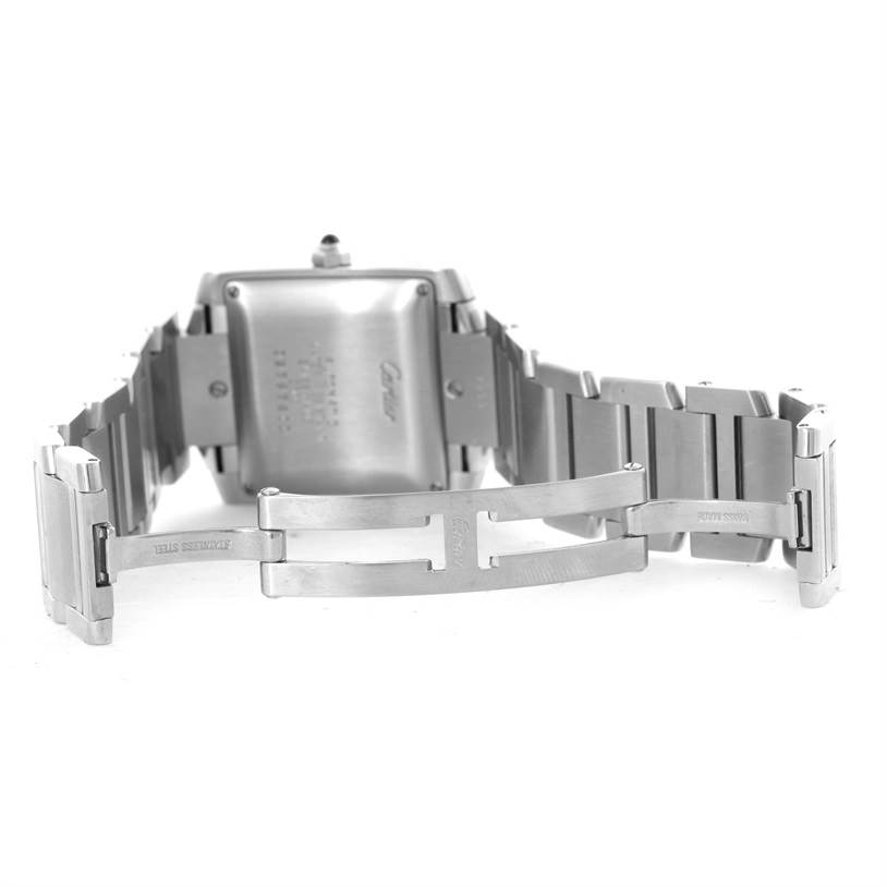 The image shows the back view of a Cartier Tank Francaise W51002Q3 Men
s Stainless Steel Silver Dial W51002Q3 Men
s Stainless Steel Silver Dial watch with its bracelet open and clasp mechanism visible.