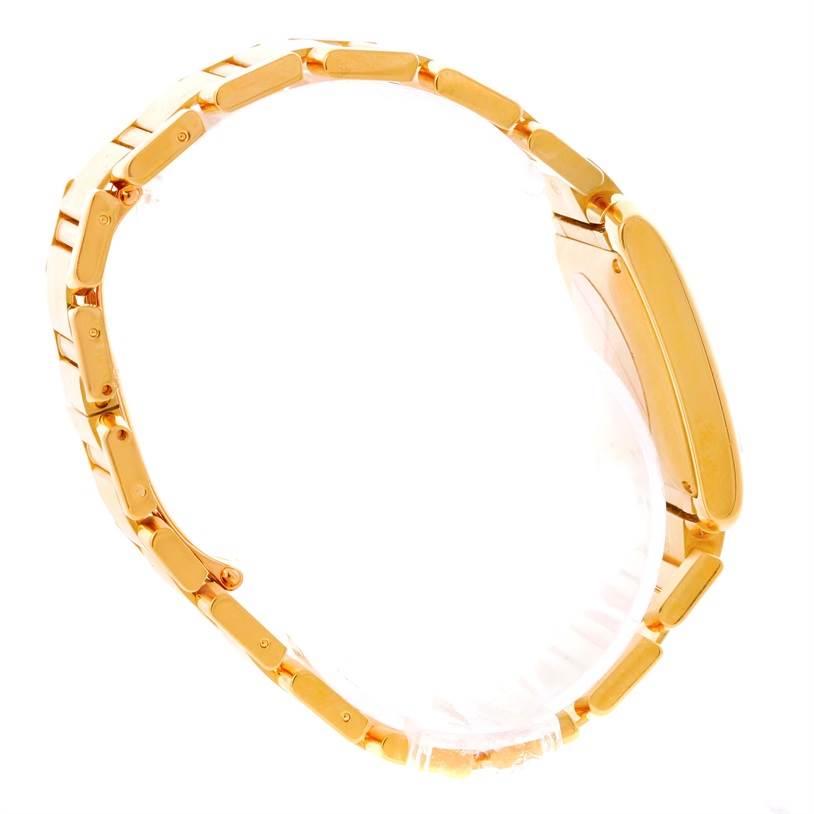 This image shows the side view of the gold bracelet and case of a Cartier Tank Francaise W50001R2 Men's Yellow Gold Silver Dial W50001R2 Men's Yellow Gold Silver Dial watch.