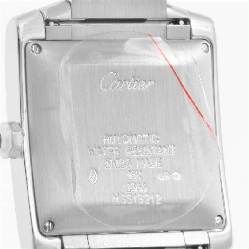 The image shows the back casing of a Cartier Tank Francaise W50011S3 White Gold Silver Dial W50011S3 White Gold Silver Dial watch, displaying its inscriptions and details.