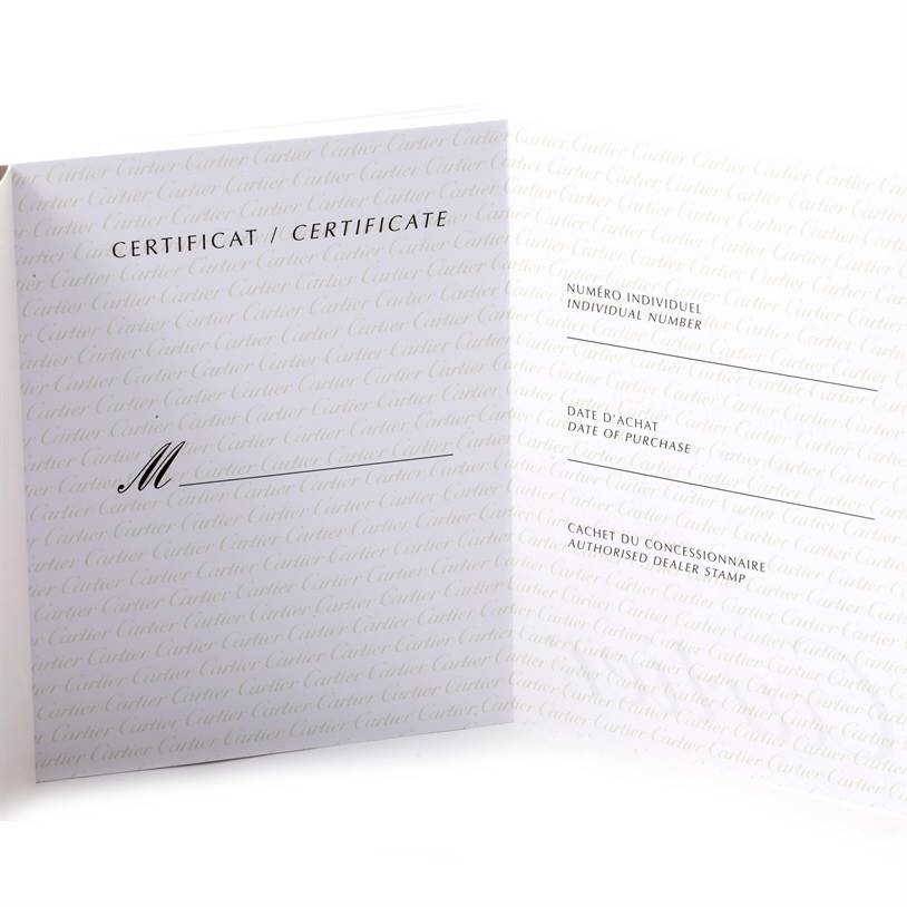 The image shows a blank warranty certificate for the Cartier Tank Française model watch.
