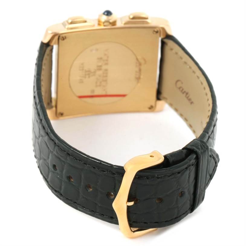 The image shows the back case and leather strap with buckle of a Cartier Tank Française watch.