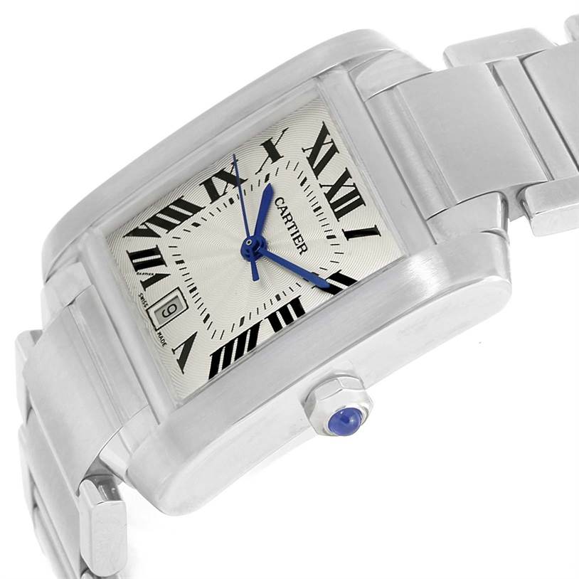 The image shows a close-up side angle of the Cartier Tank Francaise W51002Q3 Men
s Stainless Steel Silver Dial W51002Q3 Men
s Stainless Steel Silver Dial watch, highlighting its rectangular face, Roman numerals, and steel bracelet.