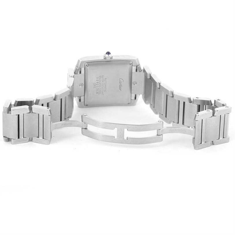 The image shows the back view of a Cartier Tank Francaise W51002Q3 Men
s Stainless Steel Silver Dial W51002Q3 Men
s Stainless Steel Silver Dial watch, focusing on the open clasp and metal bracelet.