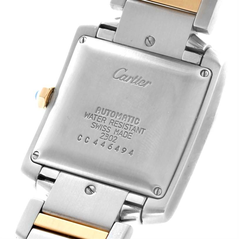 This image shows the back of a Cartier Tank Francaise W51005Q4 Men
s Steel and Gold (two tone) Silver Dial W51005Q4 Men
s Steel and Gold (two tone) Silver Dial watch, highlighting the case and part of the bracelet.