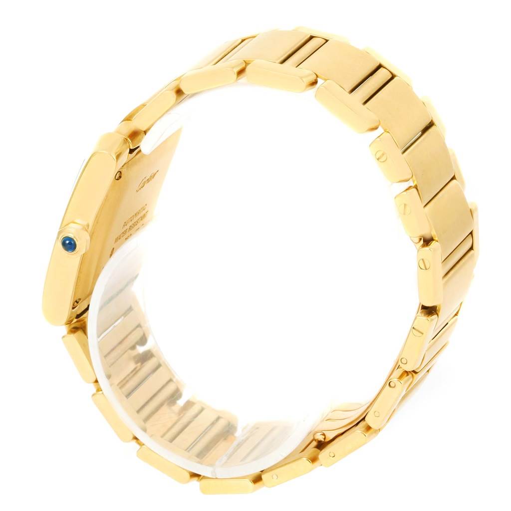 The image shows a side view of the band and case back of a Cartier Tank Française watch.