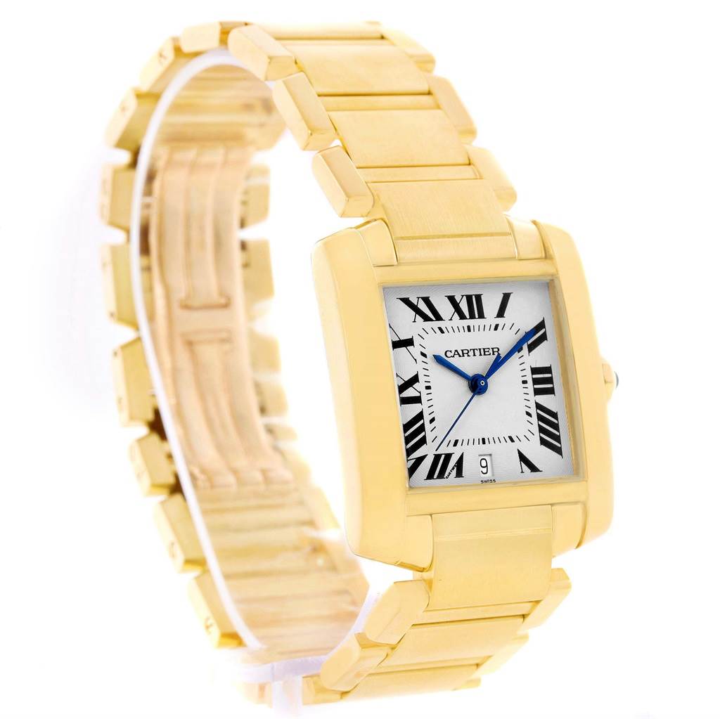 The image shows a slight front and side view of a Cartier Tank Francaise W50001R2 Yellow Gold Silver Dial W50001R2 Yellow Gold Silver Dial watch, displaying the face, bracelet, and part of the clasp.