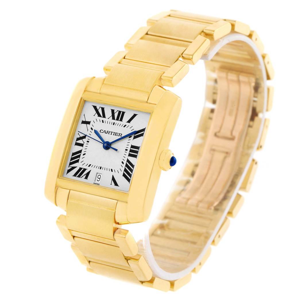 The image shows a Cartier Tank Francaise W50001R2 Yellow Gold Silver Dial W50001R2 Yellow Gold Silver Dial watch from a three-quarter angle, highlighting its gold case and bracelet.