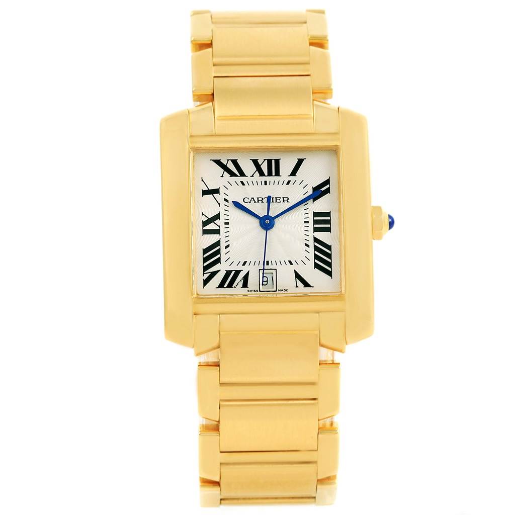 The image shows a Cartier Tank Francaise W50001R2 Yellow Gold Silver Dial W50001R2 Yellow Gold Silver Dial watch from a front angle, highlighting its rectangular face, gold bracelet, and Roman numeral dial.