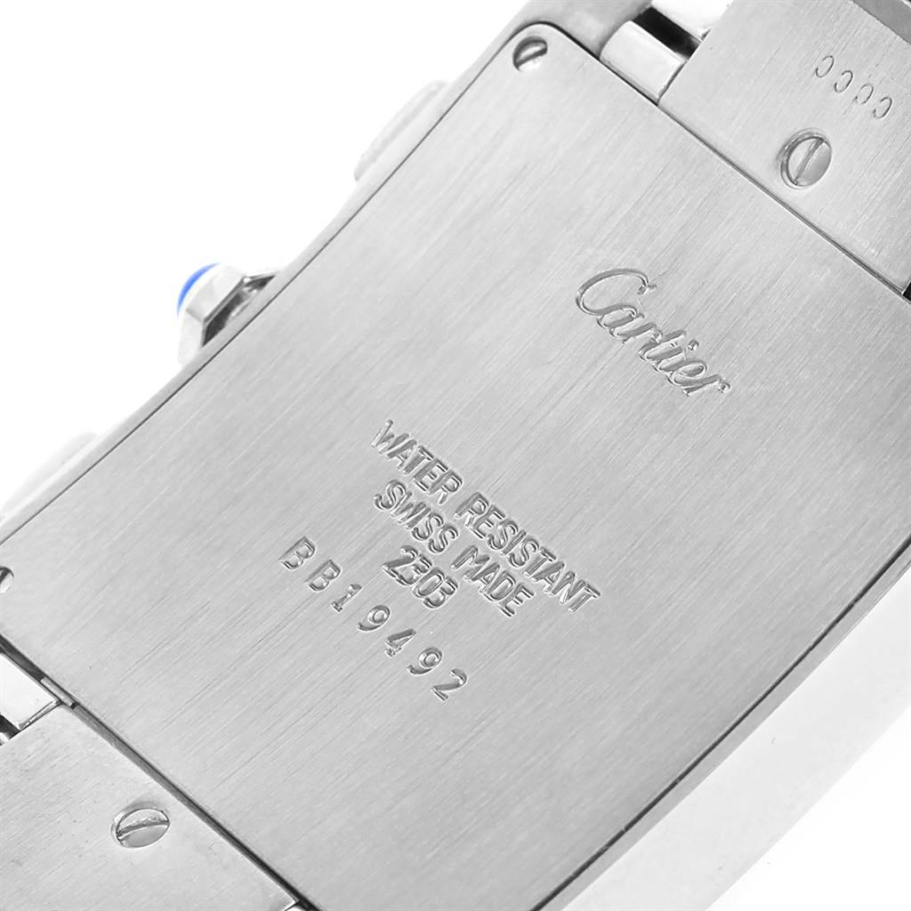 This image shows the back of the Tank Française model by Cartier, highlighting the engraved details and clasp.
