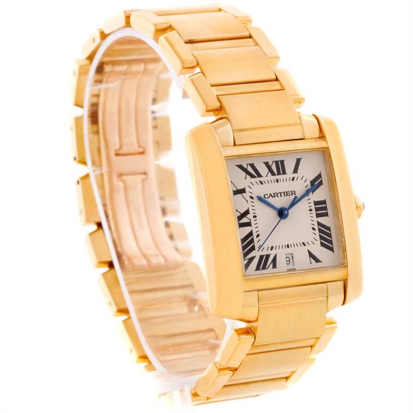 This image shows a Cartier Tank Française watch at an angled view, highlighting its gold bracelet, Roman numeral dial, and blue hands.