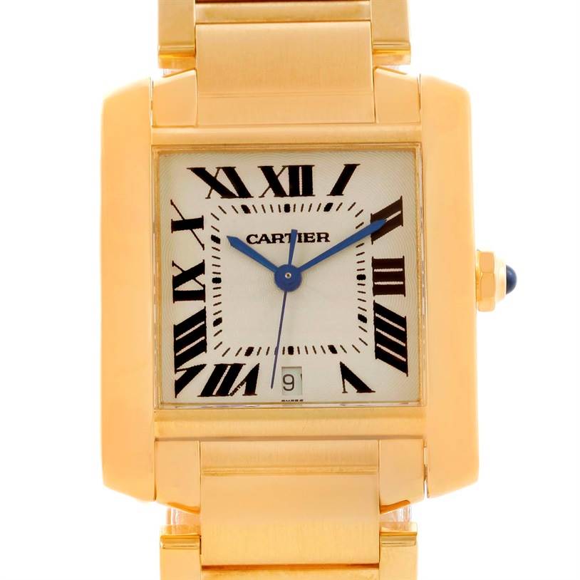 The image shows a front view of the Cartier Tank Francaise W50001R2 Men
s Yellow Gold Silver Dial W50001R2 Men
s Yellow Gold Silver Dial watch, highlighting its rectangular face, blue hands, and gold bracelet.