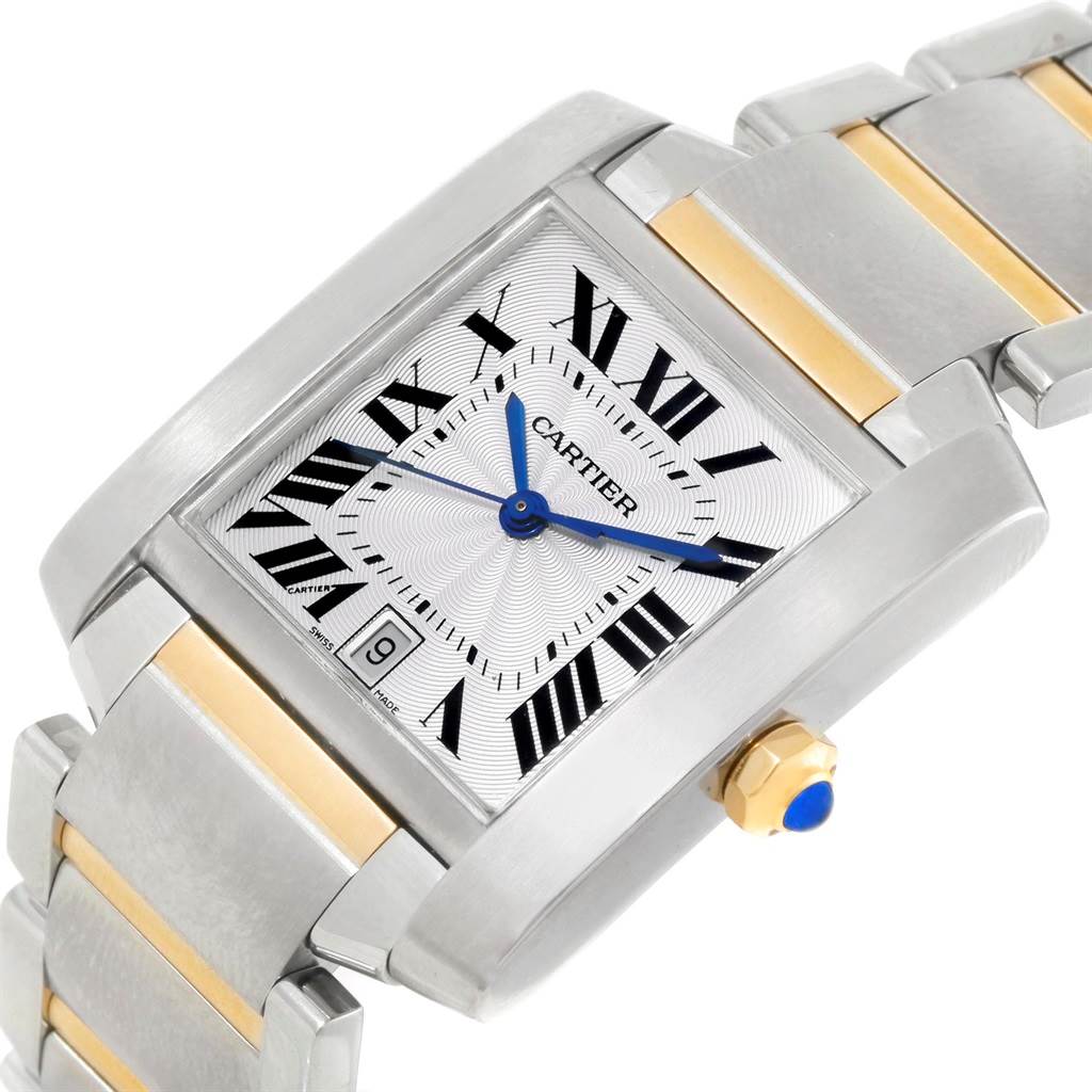 The image shows a Cartier Tank Francaise W51005Q4 Men's Steel and Gold (two tone) Silver Dial W51005Q4 Men's Steel and Gold (two tone) Silver Dial watch from an angled view, highlighting the face, bezel, bracelet, and crown.