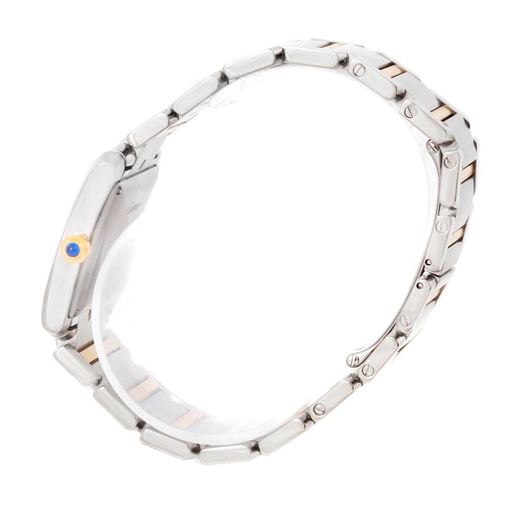 The image shows a side view of the Tank Francaise model by Cartier, highlighting its metal bracelet and crown.