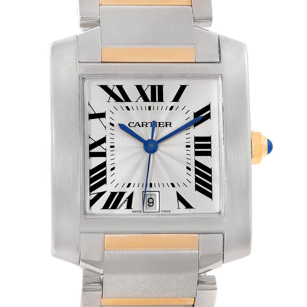 The image shows a frontal view of the Cartier Tank Francaise W51005Q4 Men
s Steel and Gold (two tone) Silver Dial W51005Q4 Men
s Steel and Gold (two tone) Silver Dial watch, highlighting its dial, Roman numerals, blue hands, and part of the metal bracelet.
