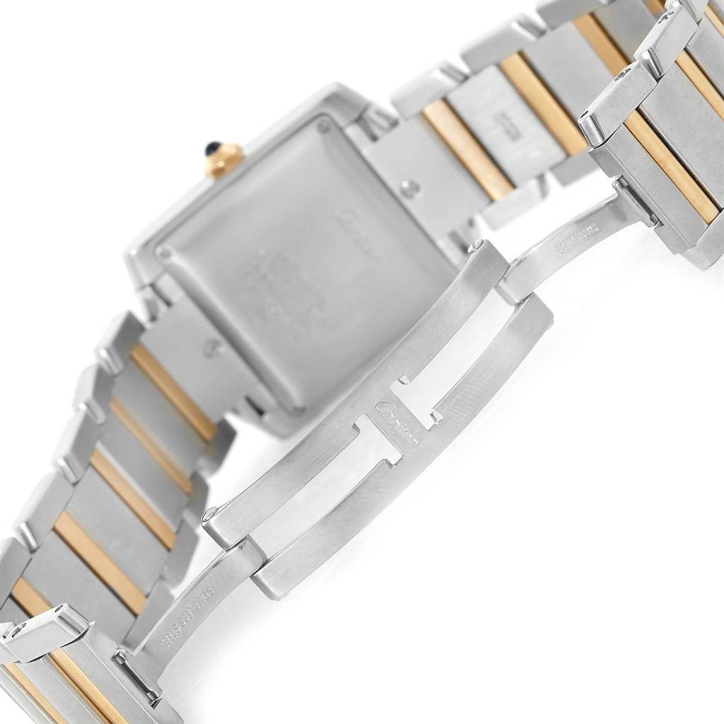 This image shows the back and clasp of a Cartier Tank Francaise W51005Q4 Men
s Steel and Gold (two tone) Silver Dial W51005Q4 Men
s Steel and Gold (two tone) Silver Dial watch at an angle.
