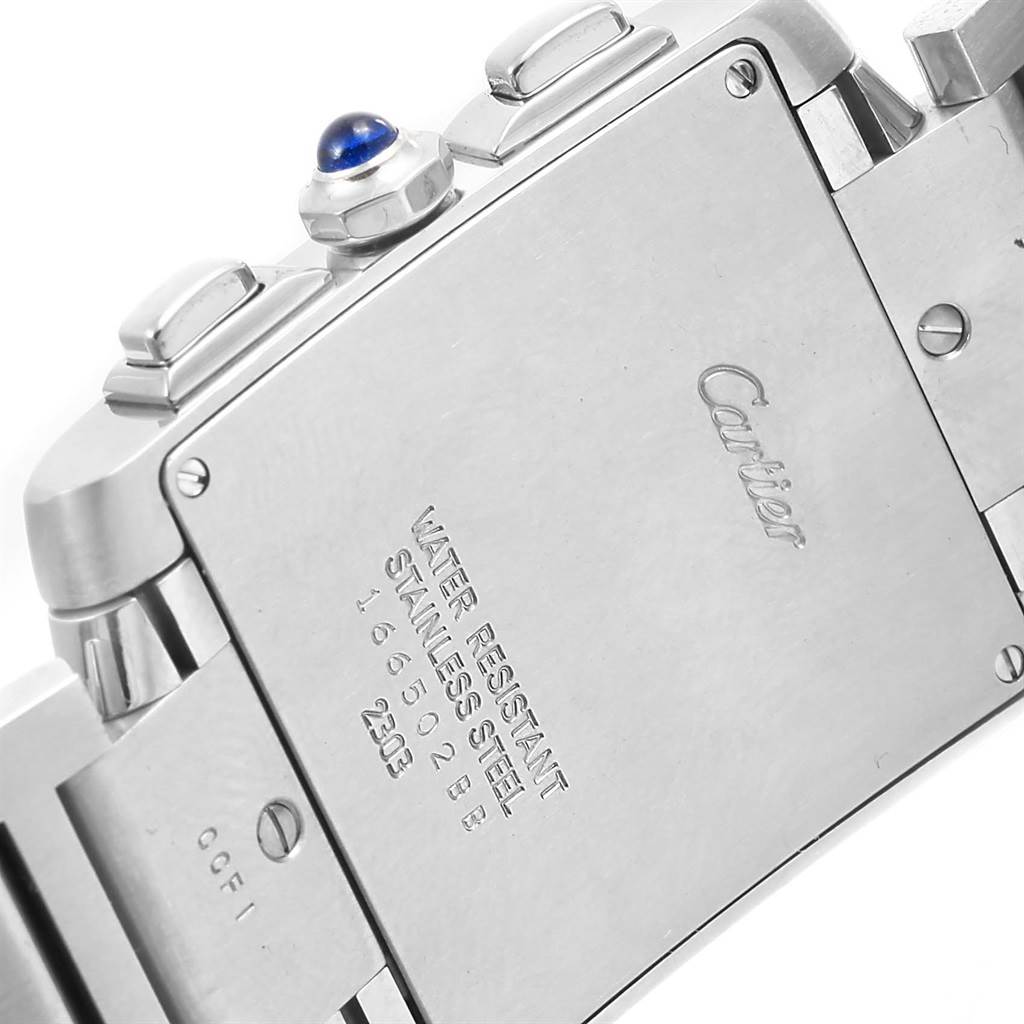 The image shows the back casing and part of the band of the Cartier Tank Francaise W51001Q3 Men
s Stainless Steel White Dial W51001Q3 Men
s Stainless Steel White Dial watch, including the crown with a blue gem.